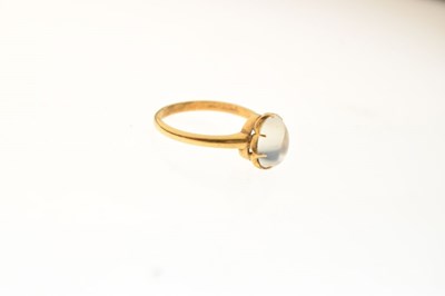 Lot 12 - Unmarked yellow metal ring  with moonstone cabochon