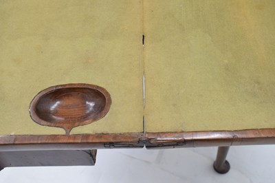 Lot 83 - Mid 18th century walnut fold-over games table