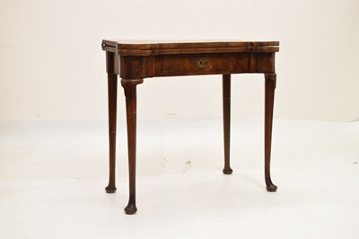 Lot 83 - Mid 18th century walnut fold-over games table