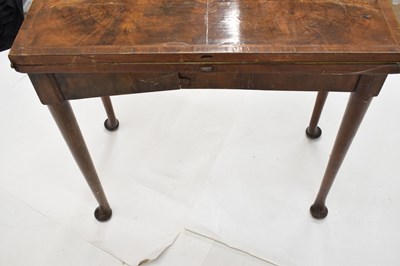 Lot 83 - Mid 18th century walnut fold-over games table