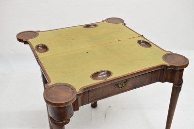 Lot 83 - Mid 18th century walnut fold-over games table