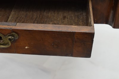 Lot 83 - Mid 18th century walnut fold-over games table