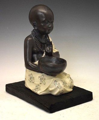 Lot 525 - Large kneeling Oriental figure