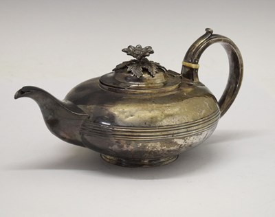 Lot 35 - William IV silver teapot of squat form with scroll handle and floral knop