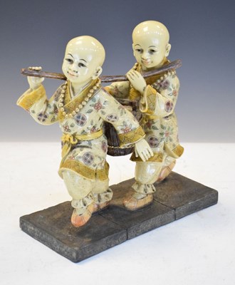 Lot 420 - Oriental group - Two boys with pail