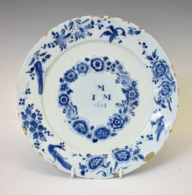 Lot 431 - Late 17th century Dutch Delft marriage plate '1694'