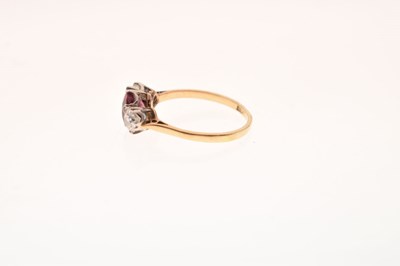 Lot 40 - Pink stone and diamond three-stone ring