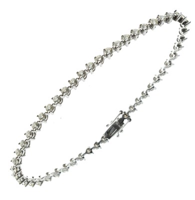 Lot 167 - Diamond line bracelet in 18ct white gold