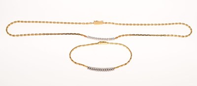 Lot 126 - Yellow metal fancy link necklace having a diamond set bar to the centre