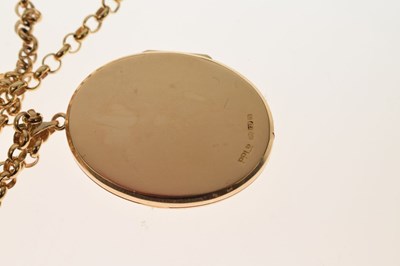 Lot 129 - 9ct gold oval locket set rubies and diamonds