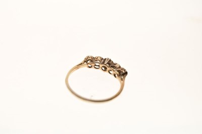 Lot 5 - Unmarked yellow metal five-stone diamond ring