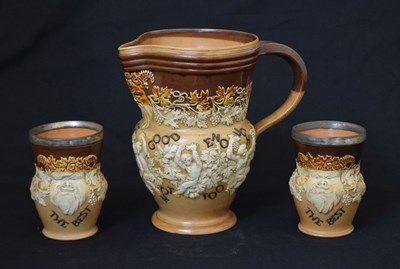 Lot 581 - Doulton Lambeth salt glaze jug and two beakers