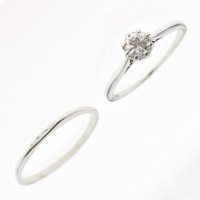 Lot 68 - Single stone diamond ring and wedding band