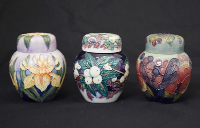 Lot 598 - Three Moorcroft ginger jars - Snowberry, Finches and Iris