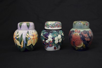 Lot 598 - Three Moorcroft ginger jars - Snowberry, Finches and Iris