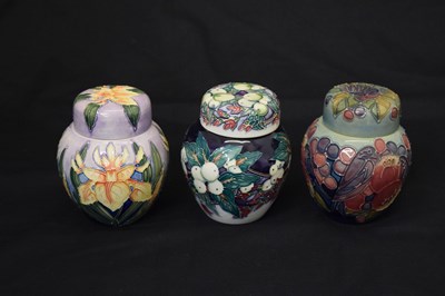 Lot 598 - Three Moorcroft ginger jars - Snowberry, Finches and Iris