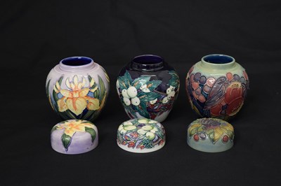 Lot 598 - Three Moorcroft ginger jars - Snowberry, Finches and Iris