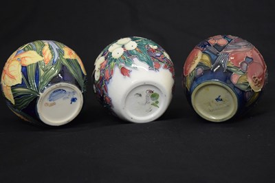 Lot 598 - Three Moorcroft ginger jars - Snowberry, Finches and Iris