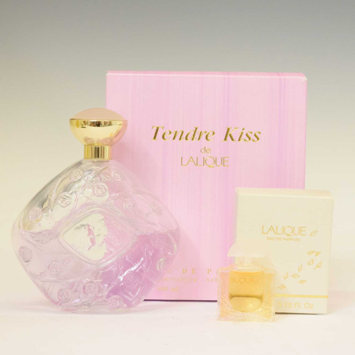 Lot 577 - Lalique Tendre Kiss perfume bottle, and one other