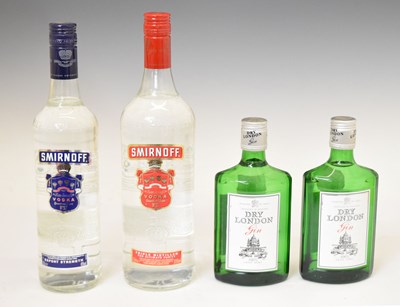 Lot 528 - Smirnoff Vodka, and Dry London Gin