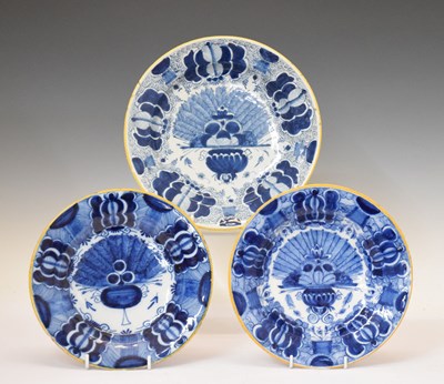 Lot 612 - Three Dutch Delft 'Peacock Tail' plates