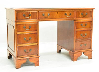 Lot 776 - Reproduction yew twin pedestal desk