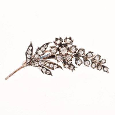 Lot 86 - Diamond set flower brooch