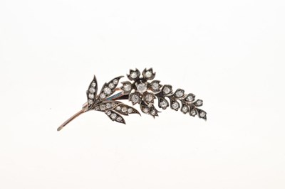 Lot 46 - Diamond set flower brooch