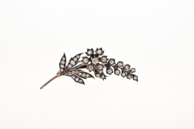 Lot 46 - Diamond set flower brooch
