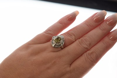 Lot 106 - Yellow diamond and diamond ballerina cluster dress ring