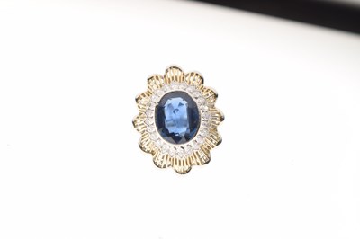 Lot 15 - Sapphire and diamond cluster dress ring