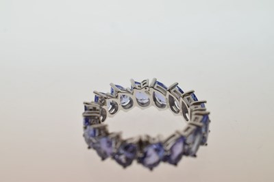 Lot 123 - Tanzanite eternity ring