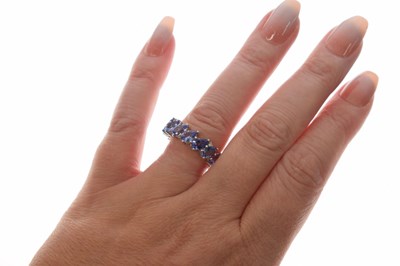 Lot 123 - Tanzanite eternity ring