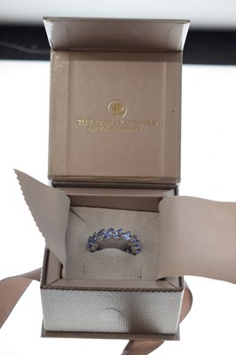 Lot 123 - Tanzanite eternity ring