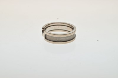 Lot 139 - Cartier - 18ct white gold torc ring