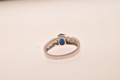 Lot 31 - Sapphire and diamond dress ring