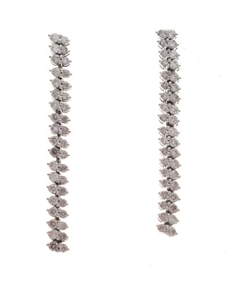 Lot 78 - Pair of long articulated diamond drop earrings