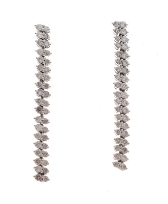 Lot 182 - Pair of long articulated diamond drop earrings