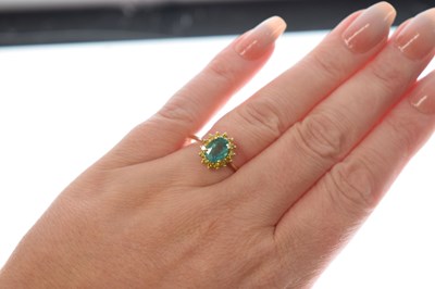 Lot 17 - Emerald and yellow diamond cluster ring