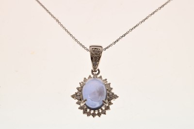 Lot 151 - Star sapphire and diamond pendant