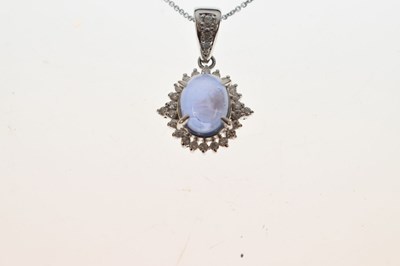 Lot 151 - Star sapphire and diamond pendant