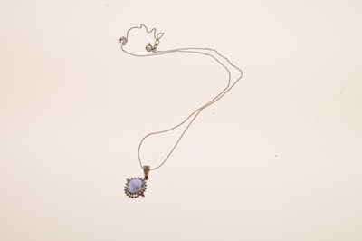 Lot 151 - Star sapphire and diamond pendant