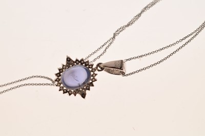 Lot 151 - Star sapphire and diamond pendant