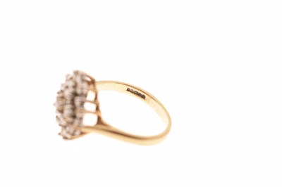 Lot 2 - 9ct gold cluster ring set white stones