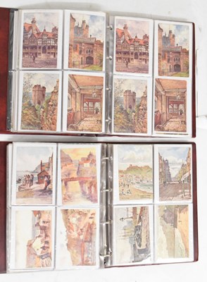 Lot 319 - Two albums of postcards