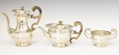 Lot 272 - Late Victorian three-piece silver set comprising sugar bowl, teapot, and coffee pot