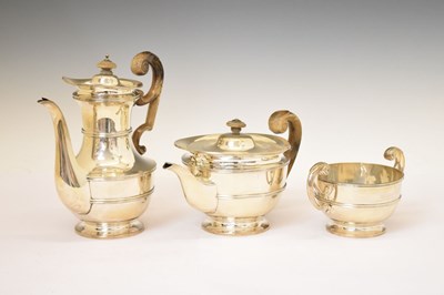 Lot 272 - Late Victorian three-piece silver set comprising sugar bowl, teapot, and coffee pot