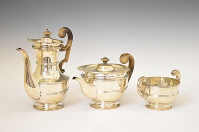 Lot 272 - Late Victorian three-piece silver set comprising sugar bowl, teapot, and coffee pot
