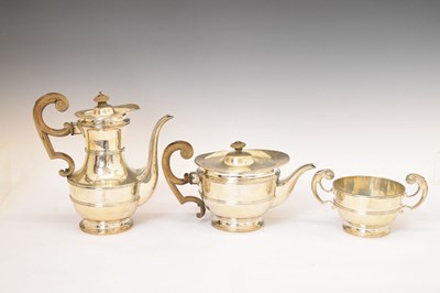 Lot 272 - Late Victorian three-piece silver set comprising sugar bowl, teapot, and coffee pot