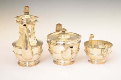 Lot 272 - Late Victorian three-piece silver set comprising sugar bowl, teapot, and coffee pot